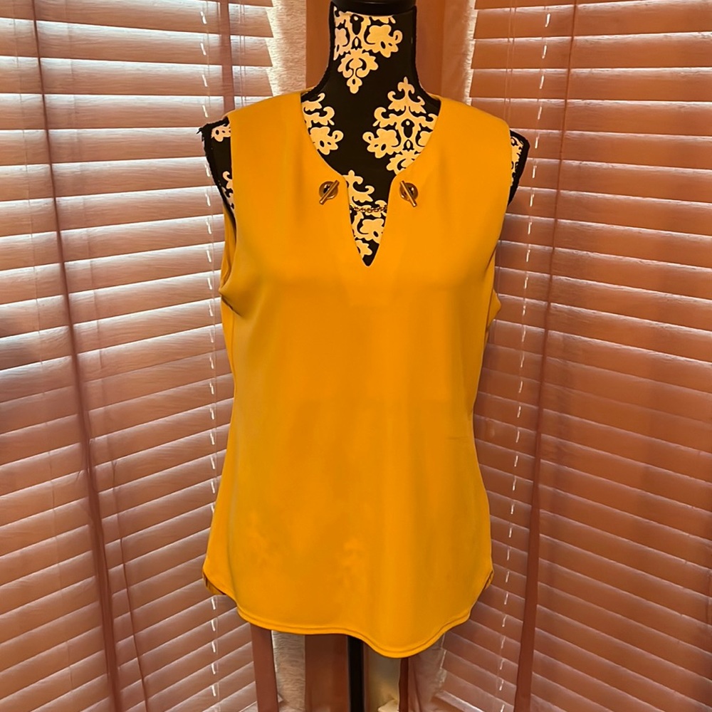 Calvin Klein. Women’s Sleeveless Blouse